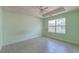 Neutral bedroom features a ceiling fan and natural light at 81 Safe Harbor Ave., Pawleys Island, SC 29585