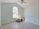 Bedroom with vaulted ceiling and light tile floors at 81 Safe Harbor Ave., Pawleys Island, SC 29585