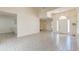 Spacious open-concept living area with tiled floors, high ceilings, and ample natural light at 81 Safe Harbor Ave., Pawleys Island, SC 29585