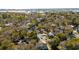 Aerial view of the neighborhood featuring mature trees and lovely landscaping with ocean in background at 837 Flicker Pl., Murrells Inlet, SC 29576