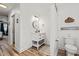 Clean and bright bathroom with white vanity, and charming decor at 837 Flicker Pl., Murrells Inlet, SC 29576