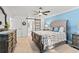 Bright bedroom featuring a king bed, paneled sliding door, and neutral decor at 837 Flicker Pl., Murrells Inlet, SC 29576