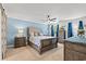 Comfortable bedroom featuring a plush bed, stylish furniture, and serene decor at 837 Flicker Pl., Murrells Inlet, SC 29576