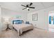 Cozy bedroom featuring a queen bed, ceiling fan, and neutral decor at 837 Flicker Pl., Murrells Inlet, SC 29576