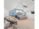 Cozy bedroom with vaulted ceiling, a ceiling fan, and comfortable sitting area at 837 Flicker Pl., Murrells Inlet, SC 29576