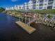 Scenic dock over the water featuring a covered seating area with 'slow wake zone' signs at 901 West Port Dr. # 2101, North Myrtle Beach, SC 29582