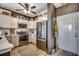 Modern kitchen with stainless steel appliances, white cabinets, and a decorative backsplash at 901 West Port Dr. # 2101, North Myrtle Beach, SC 29582
