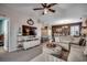 Open living area with a large TV, comfortable sectional, and view into the kitchen at 901 West Port Dr. # 2101, North Myrtle Beach, SC 29582