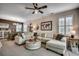 Bright living room featuring a ceiling fan, comfortable seating, and stylish decor at 901 West Port Dr. # 2101, North Myrtle Beach, SC 29582