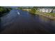 Scenic waterfront view of the property with water, and lush trees at 901 West Port Dr. # 2101, North Myrtle Beach, SC 29582