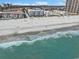 Coastal view of the beach with a condominium with beach access to the sandy shore at 9580 Shore Dr. # 311, Myrtle Beach, SC 29572