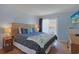 Bright bedroom with king bed, balcony access, and a relaxing coastal aesthetic at 9580 Shore Dr. # 311, Myrtle Beach, SC 29572