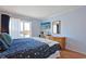 Cozy bedroom with balcony access, flatscreen, and light-filled space at 9580 Shore Dr. # 311, Myrtle Beach, SC 29572
