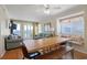 Open dining area with views to the living room and access to the balcony at 9580 Shore Dr. # 311, Myrtle Beach, SC 29572