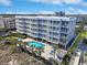 Beautiful multifamily condo building with a pool and balconies overlooking the ocean at 9580 Shore Dr. # 311, Myrtle Beach, SC 29572
