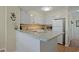 Well-maintained kitchen featuring stainless steel appliances and a breakfast bar at 9580 Shore Dr. # 311, Myrtle Beach, SC 29572