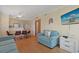 Cozy living area open to dining, featuring comfortable seating and natural light at 9580 Shore Dr. # 311, Myrtle Beach, SC 29572