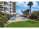 Resort pool area with lots of lounge chairs and lush landscaping; perfect for relaxing at 9580 Shore Dr. # 311, Myrtle Beach, SC 29572