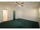 Vaulted bedroom with ensuite bathroom and closet at 9972 Conifer Ln., Murrells Inlet, SC 29576