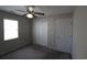 Bedroom featuring carpeted floors, a ceiling fan, and closet at 9972 Conifer Ln., Murrells Inlet, SC 29576