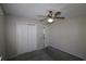 Bedroom featuring carpeted floors, a ceiling fan, and closet at 9972 Conifer Ln., Murrells Inlet, SC 29576