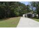 Charming house with a spacious lawn, and long driveway at 9972 Conifer Ln., Murrells Inlet, SC 29576