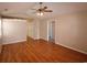 Spacious room featuring hardwood floors and ample closet space, with natural light and neutral walls at 9972 Conifer Ln., Murrells Inlet, SC 29576