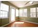 Inviting sunroom with multiple windows, filling the space with natural light at 9972 Conifer Ln., Murrells Inlet, SC 29576
