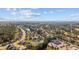 Extensive aerial view of a residential area with lakes, showcasing neighborhood layout and surrounding greenery at 1112 Raven Cliff Ct., Conway, SC 29526