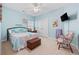 Cozy bedroom with a comfortable bed, ceiling fan, and carpeted floor at 1112 Raven Cliff Ct., Conway, SC 29526
