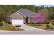 Attractive brick home with a well-kept lawn, showcasing its curb appeal and inviting entrance at 1112 Raven Cliff Ct., Conway, SC 29526