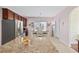 Kitchen with granite countertops, stainless steel appliances, tile floors, and a breakfast table near the window at 1112 Raven Cliff Ct., Conway, SC 29526