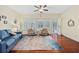Cozy sunroom with hardwood floors, large windows, and access to the outdoors at 1112 Raven Cliff Ct., Conway, SC 29526