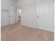 Neutral bedroom featuring carpet, a walk-in closet, and plenty of natural light at 1130 Inlet View Dr., North Myrtle Beach, SC 29582