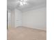 Spacious bedroom showcasing neutral decor, plush carpet and a ceiling fan at 1130 Inlet View Dr., North Myrtle Beach, SC 29582