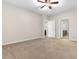 Bedroom featuring neutral walls and carpeting with doors leading to the bath at 1130 Inlet View Dr., North Myrtle Beach, SC 29582