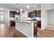 Kitchen with island, stainless steel appliances, granite countertops, and open layout to the breakfast area at 1130 Inlet View Dr., North Myrtle Beach, SC 29582