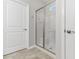 Modern bathroom featuring a glass enclosed shower and tile flooring at 1130 Inlet View Dr., North Myrtle Beach, SC 29582