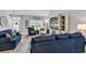Living room features coastal decor, including a nautical rug, and vaulted ceiling at 329 Lake Mist Ct., Longs, SC 29568