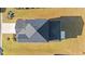 Top-down aerial view of roof and yard with healthy grass and symmetrical design; highlighting property features at 4032 Bayhill St., Myrtle Beach, SC 29579