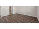 Clean bedroom space with wood flooring and a bathroom right next door at 4032 Bayhill St., Myrtle Beach, SC 29579