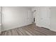 Bedroom featuring hardwood floors, neutral walls, and doorways looking into other rooms at 4032 Bayhill St., Myrtle Beach, SC 29579