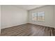 Cozy bedroom with wood flooring and bright windows at 4032 Bayhill St., Myrtle Beach, SC 29579