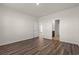 Large bonus room with wood floors and an open doorway to the bathroom at 4032 Bayhill St., Myrtle Beach, SC 29579