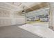 Spacious garage with large door and concrete flooring looking into residential street and homes at 4032 Bayhill St., Myrtle Beach, SC 29579
