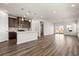 Spacious open-concept kitchen and living area with modern finishes and hardwood floors at 4032 Bayhill St., Myrtle Beach, SC 29579