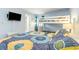 Bedroom with bunkbeds, desk, and television at 707 S Ocean Blvd. # 602, North Myrtle Beach, SC 29582