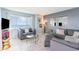 Living room features tile floor and ocean view through the window at 707 S Ocean Blvd. # 602, North Myrtle Beach, SC 29582