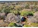 Aerial view of a charming home nestled in a community surrounded by lush trees at 95 Weehawka Way # 2, Pawleys Island, SC 29585