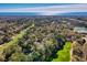 Stunning aerial view showcasing a scenic golf course and the ocean at 95 Weehawka Way # 2, Pawleys Island, SC 29585